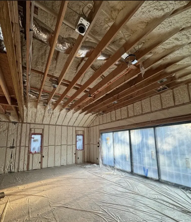 Interior walls and ceiling insulated with spray foam during new construction in San Juan Capistrano
